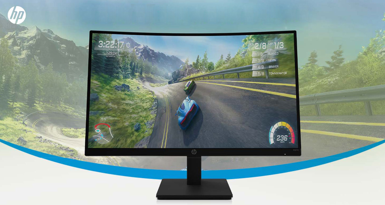 An X27c monitor shows a game scene of two race cars are competiting on a road